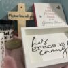 Grace is enough written inside a box along with other products
