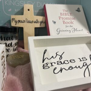 Grace is enough written inside a box along with other products