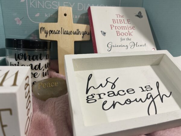 Grace is enough written inside a box along with other products