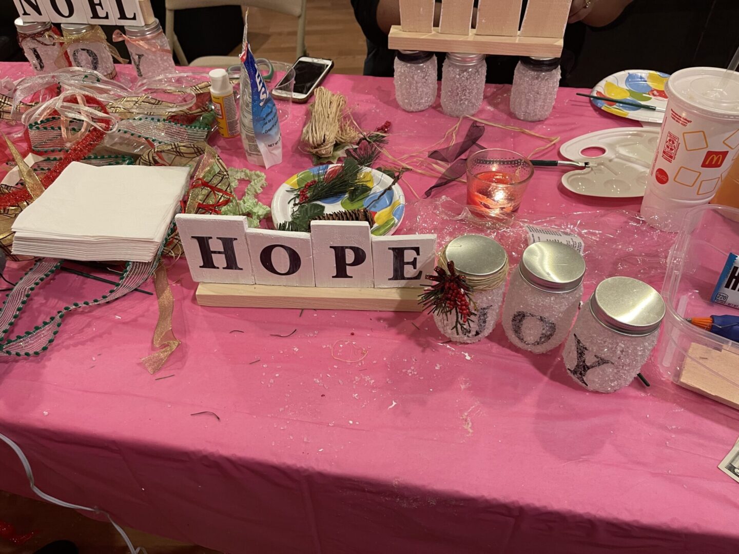 Hope written on the table along with other objects